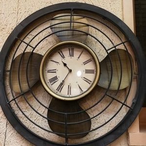 horloge mural en forme de ventilateur en métal vieilli doré et noir